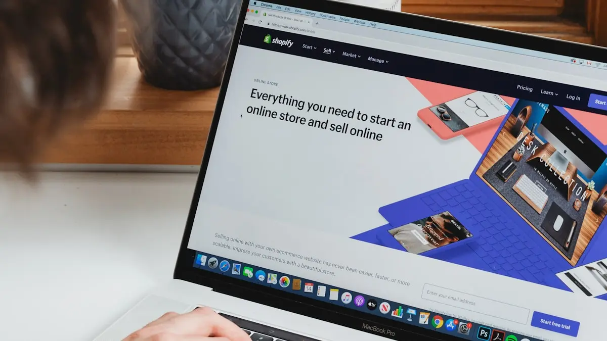 Person managing an online storefront on a laptop