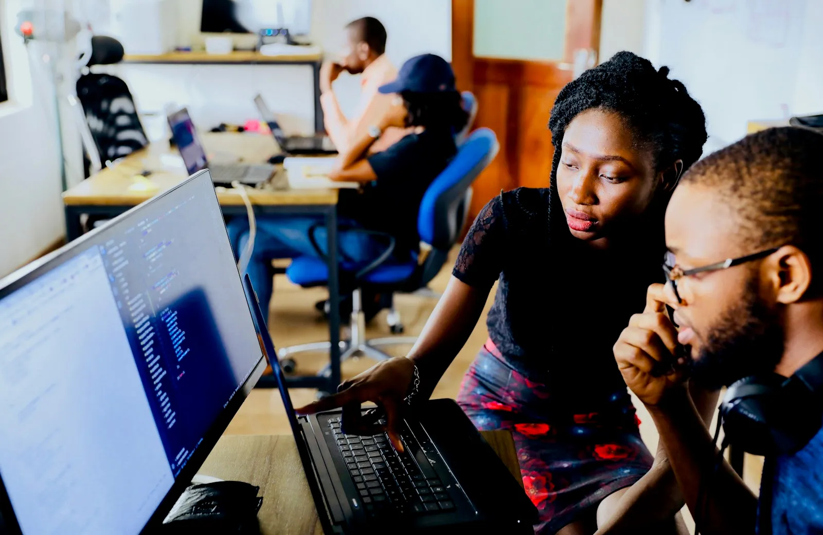 Diverse support team collaborating on a customer issue